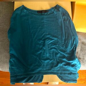 Turquoise Rebecca Michael’s flowy blouse